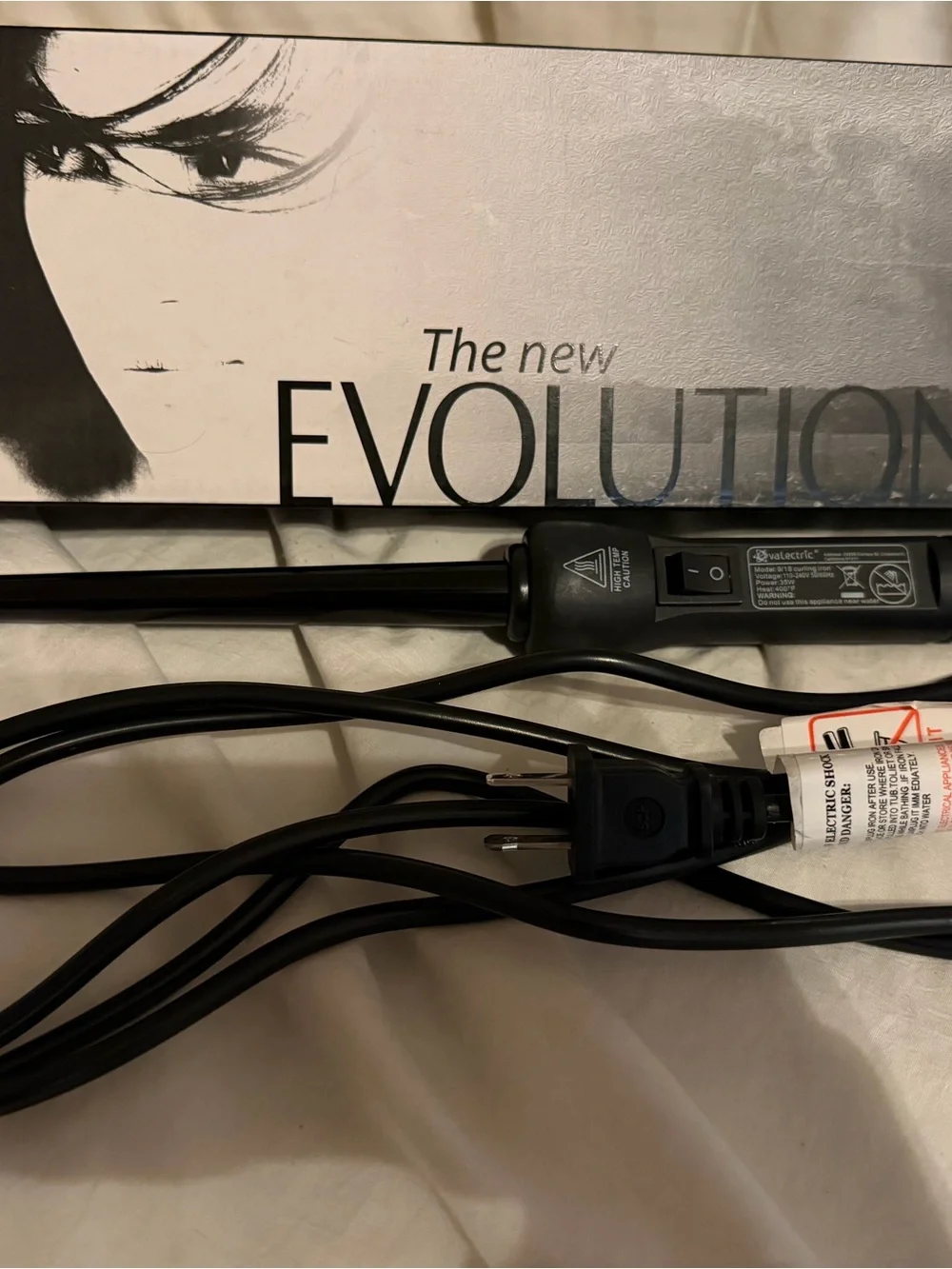 Evolution black curling